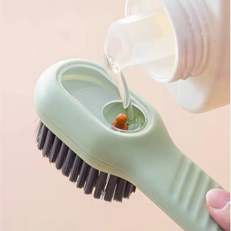 Liquid soap dispenser cleaning brush